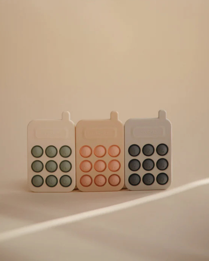 MUSHIE - PHONE PRESS TOY - BLUSH
